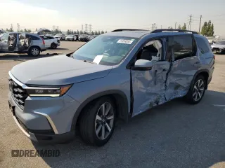 2023 Honda Pilot Touring with VIN 5FNYG2H71PB008678, listed as a Copart auction lot 71089054 with 16,664 mi miles and Salvage Title. Bid and sale history available at carsss.com. Image 1.