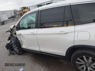 2019 Honda Pilot EX-L with VIN 5FNYF6H59KB075577, listed as a IAAI auction lot 41863841 with 102,242 mi miles and . Bid and sale history available at carsss.com. Image 14.