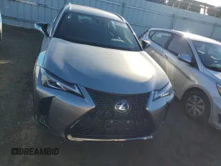 2021 Lexus UX with VIN JTHE9JBH3M2050145, listed as a Copart auction lot 86389664 with 24,937 mi miles and Salvage Title. Bid and sale history available at carsss.com. Image 5.
