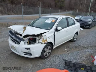 2011 Chevrolet Aveo LT w/1LT with VIN KL1TD5DE2BB230366, listed as a IAAI auction lot 41472714 with 151,915 mi miles. Bid and sale history available at carsss.com. Image 19.
