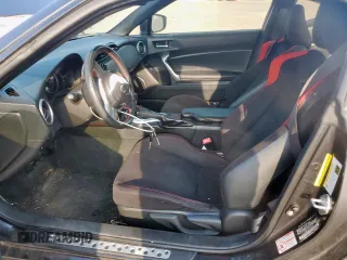 2016 Scion FR-S z VIN JF1ZNAA1XG8709638, wystawiony jako Copart lot #59103905 z przebiegiem 51 987 mil mil oraz Szkoda całkowita • Salvage title. Historia ofert i sprzedaży dostępna na DreamBid. Obrazek 7.