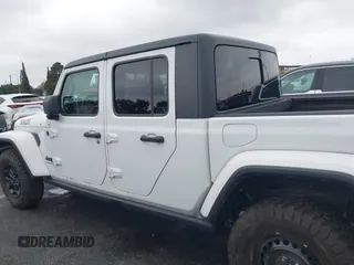 2022 Jeep Gladiator Willys with VIN 1C6HJTAG1NL148524, listed as a IAAI auction lot 41507693 with 42,004 mi miles and . Bid and sale history available at DreamBid. Image 14.