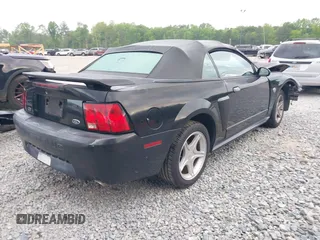 2004 Ford Mustang GT Deluxe z VIN 1FAFP45X64F104911, wystawiony jako IAAI lot #42025366 z przebiegiem 78 686 mil mil oraz . Historia ofert i sprzedaży dostępna na DreamBid. Obrazek 4.