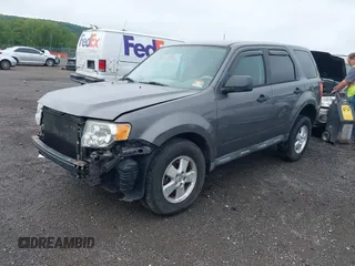 2012 Ford Escape XLS with VIN 1FMCU0C74CKB60736, listed as a IAAI auction lot 42384887 with 97,258 mi miles and . Bid and sale history available at DreamBid. Image 2.