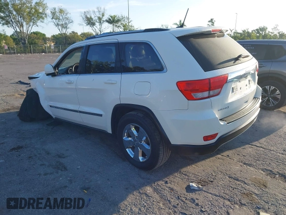 2011 Jeep Grand Cherokee Laredo with VIN 1J4RS4GGXBC739433, listed as a IAAI auction lot 41794031 with 174,672 mi miles and . Bid and sale history available at DreamBid. Image 3.