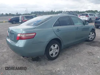 2007 Toyota Camry CE with VIN 4T1BE46K37U569515, listed as a IAAI auction lot 41974482 with 242,042 mi miles. Bid and sale history available at carsss.com. Image 4.