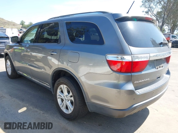 2012 Dodge Durango Crew with VIN 1C4RDHDG2CC317136, listed as a IAAI auction lot 41993837 with 131,048 mi miles and . Bid and sale history available at DreamBid. Image 3.