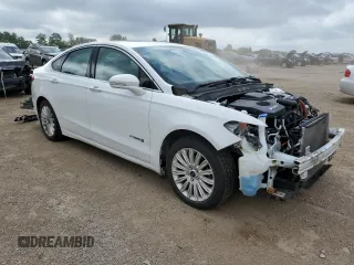 2016 Ford Fusion SE Hybrid with VIN 3FA6P0LUXGR184285, listed as a Copart auction lot 62699805 with 132,264 mi miles and Salvage title. Bid and sale history available at DreamBid. Image 4.
