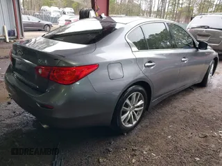 2015 Infiniti Q50 Premium z VIN JN1BV7ARXFM411040, wystawiony jako IAAI lot #41706295 z przebiegiem 97 297 mil mil oraz . Historia ofert i sprzedaży dostępna na DreamBid. Obrazek 4.