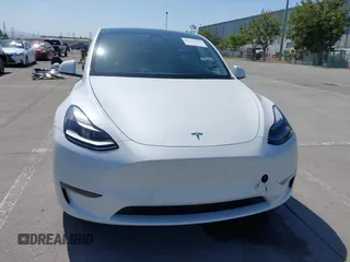 2022 Tesla Model Y Performance z VIN 7SAYGDEF2NF347456, wystawiony jako IAAI lot #42177725 z przebiegiem 29 374 mil mil oraz . Historia ofert i sprzedaży dostępna na DreamBid. Obrazek 13.