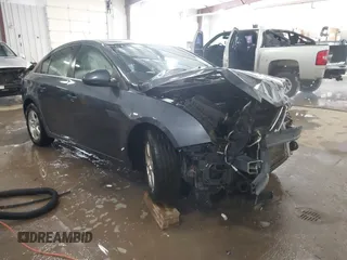 2014 Chevrolet Cruze 1LT with VIN 1G1PC5SB0E7112323, listed as a IAAI auction lot 41571759 with 191,477 mi miles and . Bid and sale history available at DreamBid. Image 1.