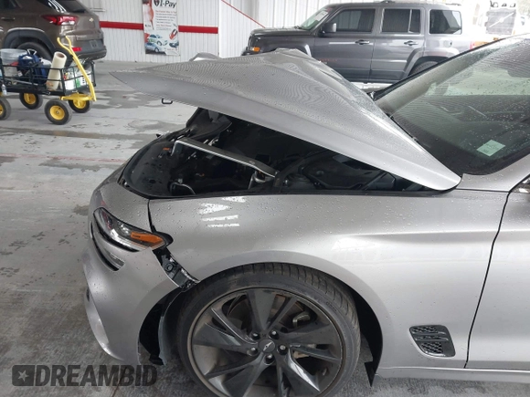 2023 Genesis G70 2.0T z VIN KMTG34TA8PU111790, wystawiony jako IAAI lot #41390217 z przebiegiem 35 303 mil mil oraz . Historia ofert i sprzedaży dostępna na DreamBid. Obrazek 6.