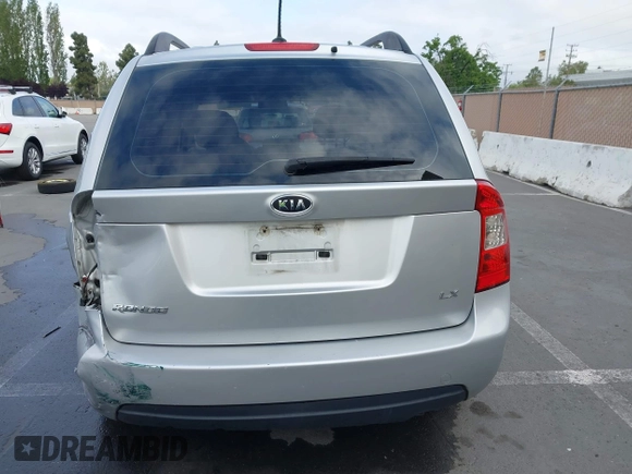 2009 Kia Rondo LX with VIN KNAFG528497222225, listed as a IAAI auction lot 42108192 with 113,040 mi miles. Bid and sale history available at carsss.com. Image 17.