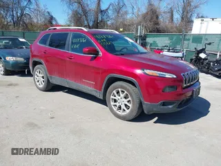 2015 Jeep Cherokee Latitude with VIN 1C4PJMCB6FW714656, listed as a IAAI auction lot 41887261 with 131,600 mi miles and . Bid and sale history available at carsss.com. Image 1.