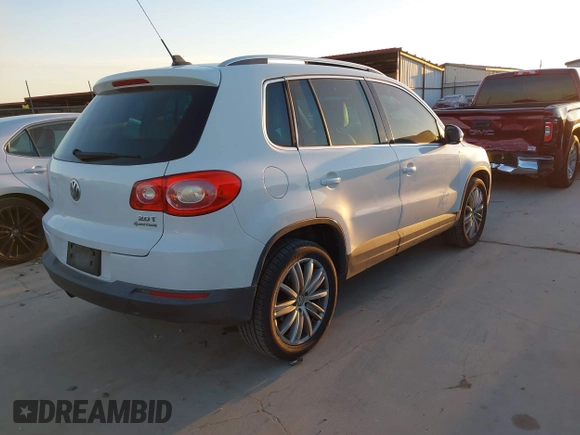 2010 Volkswagen Tiguan SEL with VIN WVGBV7AX4AW514362, listed as a IAAI auction lot 41413300 with 154,201 mi miles and . Bid and sale history available at DreamBid. Image 4.