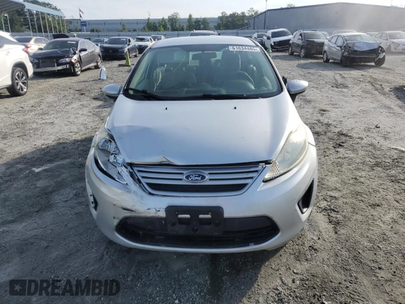 2013 Ford Fiesta S z VIN 3FADP4AJ9DM140665, wystawiony jako Copart lot #61634485 z przebiegiem 165 124 mil mil oraz Szkoda całkowita • Salvage title. Historia ofert i sprzedaży dostępna na DreamBid. Obrazek 5.