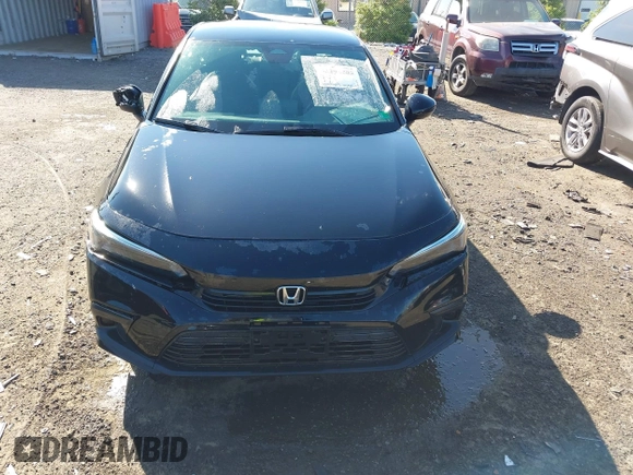 2023 Honda Civic Sport with VIN 2HGFE2F56PH509382, listed as a IAAI auction lot 42296205 with 125,584 mi miles and . Bid and sale history available at DreamBid. Image 12.