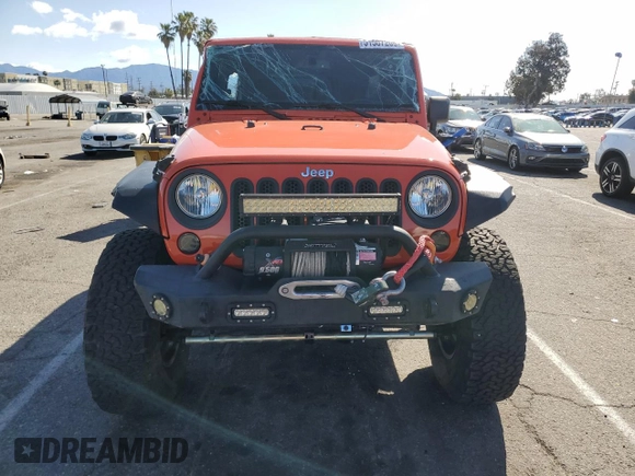 2015 Jeep Wrangler Unlimited Rubicon with VIN 1C4BJWFG7FL719038, listed as a Copart auction lot 51507205 with 62,664 mi miles and Salvage Title. Bid and sale history available at carsss.com. Image 5.