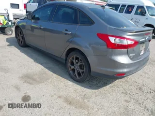 2013 Ford Focus SE with VIN 1FADP3F28DL233822, listed as a IAAI auction lot 42583041 with 135,728 mi miles and . Bid and sale history available at DreamBid. Image 3.