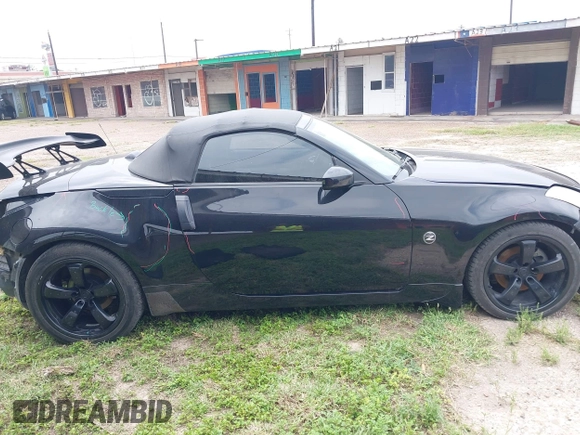 2004 Nissan 350Z Touring with VIN JN1AZ36A44T011330, listed as a IAAI auction lot 41925648 with 139,353 mi miles. Bid and sale history available at carsss.com. Image 14.