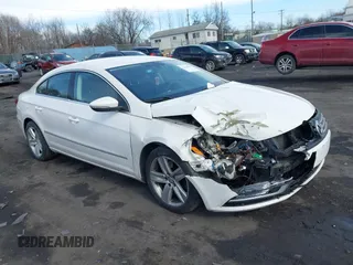 2013 Volkswagen CC Sport with VIN WVWBN7AN9DE516590, listed as a IAAI auction lot 41684586 with 153,312 mi miles. Bid and sale history available at carsss.com. Image 1.