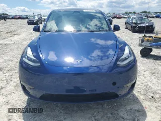2022 Tesla Model Y Long Range z VIN 7SAYGDEE4NF426893, wystawiony jako Copart lot #55809275 z przebiegiem 16 083 mil mil oraz Szkoda całkowita • Salvage title. Historia ofert i sprzedaży dostępna na DreamBid. Obrazek 5.
