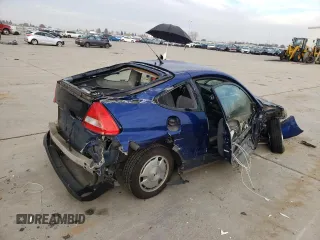 2003 Honda Insight z VIN JHMZE14733T000310, wystawiony jako Copart lot #83232164 z przebiegiem 116 183 mil mil oraz Szkoda całkowita • Salvage title. Historia ofert i sprzedaży dostępna na DreamBid. Obrazek 3.