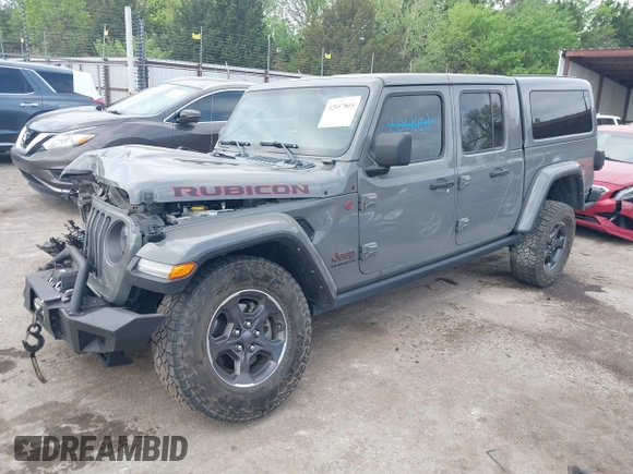 2021 Jeep Gladiator Rubicon with VIN 1C6JJTBG8ML619972, listed as a IAAI auction lot 42057805 with 37,875 mi miles and . Bid and sale history available at DreamBid. Image 2.