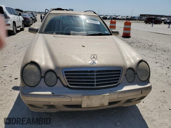 2003 Mercedes-Benz E-Class AWD with VIN WDBJH82J93X088042, listed as a Copart auction lot 70566864 with 167,374 mi miles and Salvage Title. Bid and sale history available at carsss.com. Image 5.