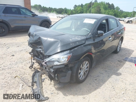 2019 Nissan Sentra S z VIN 3N1AB7AP6KY431618, wystawiony jako IAAI lot #42168154 z przebiegiem 117 492 mil mil oraz . Historia ofert i sprzedaży dostępna na DreamBid. Obrazek 16.