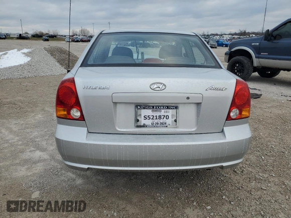 2004 Hyundai Accent GL with VIN KMHCG45C94U564176, listed as a Copart auction lot 82963944 with 454,400 mi miles and Salvage Title. Bid and sale history available at carsss.com. Image 6.
