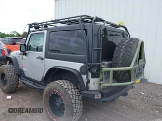 2007 Jeep Wrangler X with VIN 1J4FA24117L142513, listed as a IAAI auction lot 42314284 with 70,213 mi miles and . Bid and sale history available at DreamBid. Image 3.