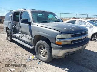 2002 Chevrolet Suburban LT z VIN 1GNEC16Z92J244114, wystawiony jako IAAI lot #41685351 z przebiegiem 256 310 mil mil oraz . Historia ofert i sprzedaży dostępna na DreamBid. Obrazek 1.