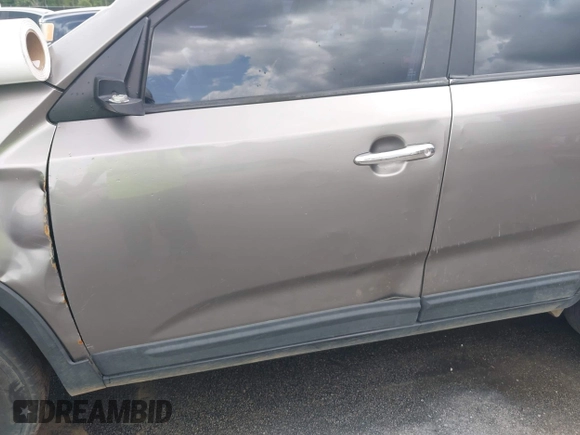 2013 Kia Sorento LX with VIN 5XYKT3A1XDG381218, listed as a IAAI auction lot 42511747 with 130,253 mi miles and . Bid and sale history available at DreamBid. Image 12.