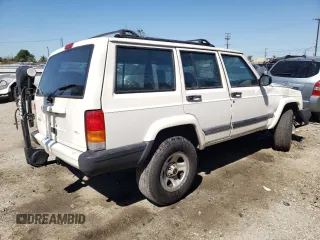 1999 Jeep Cherokee Sport with VIN 1J4FT68S9XL627003, listed as a Copart auction lot 49478595 with 320,444 mi miles and Salvage title. Bid and sale history available at DreamBid. Image 3.