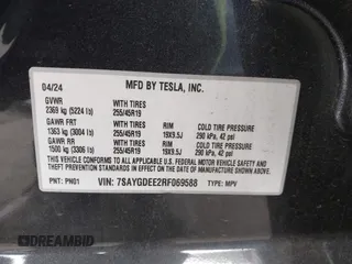 2024 Tesla Model Y Long Range z VIN 7SAYGDEE2RF069588, wystawiony jako IAAI lot #42024180 z przebiegiem 13 230 mil mil oraz . Historia ofert i sprzedaży dostępna na DreamBid. Obrazek 9.