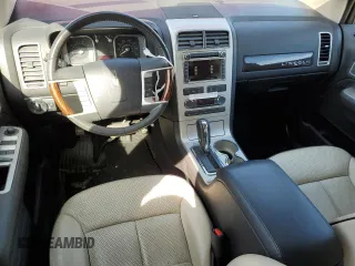 2010 Lincoln MKX with VIN 2LMDJ8JC2ABJ31128, listed as a Copart auction lot 41861205 with 56,661 mi miles and Salvage Title. Bid and sale history available at DreamBid. Image 8.
