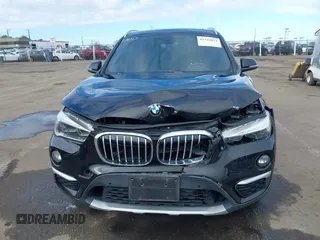 2017 BMW X1 sDrive28i with VIN WBXHU7C3XHP924635, listed as a IAAI auction lot 41744824 with 74,143 mi miles. Bid and sale history available at carsss.com. Image 12.