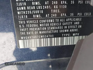 2012 Volkswagen Tiguan SE with VIN WVGAV7AX7CW534703, listed as a IAAI auction lot 42463358 with 119,699 mi miles and . Bid and sale history available at DreamBid. Image 9.