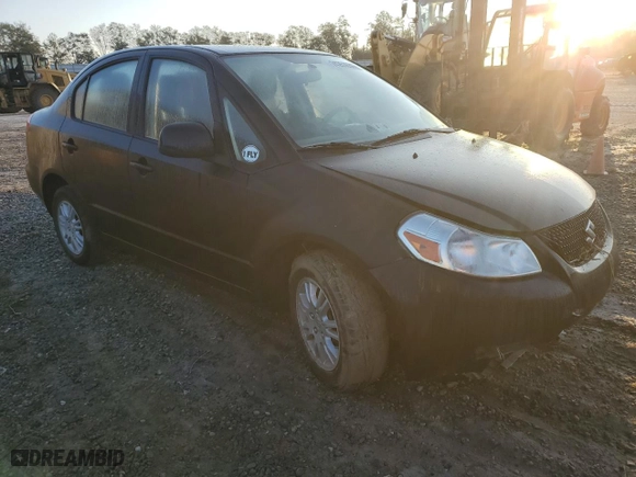 2013 Suzuki SX4 LE with VIN JS2YC5A34D6102748, listed as a Copart auction lot 74253634 with 44,386 mi miles and Salvage Title. Bid and sale history available at carsss.com. Image 4.