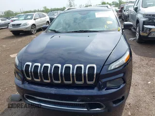 2015 Jeep Cherokee Limited with VIN 1C4PJLDBXFW658441, listed as a IAAI auction lot 42167135 with Not Provided miles and . Bid and sale history available at DreamBid. Image 12.