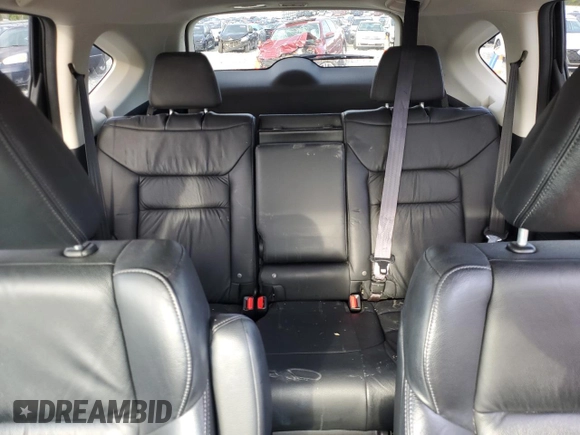 2013 Honda CR-V EX-L z VIN 2HKRM4H71DH662733, wystawiony jako Copart lot #53047155 z przebiegiem 212 443 mil mil oraz Szkoda całkowita • Salvage title. Historia ofert i sprzedaży dostępna na DreamBid. Obrazek 10.