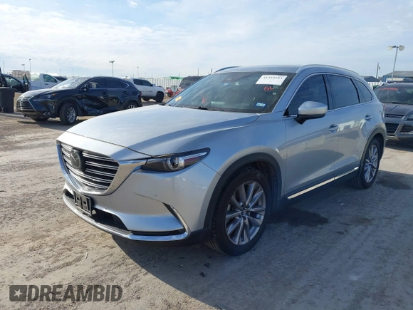2020 Mazda CX-9 Grand Touring z VIN JM3TCADY7L0416696, wystawiony jako IAAI lot #41310183 z przebiegiem 105 754 mil mil oraz . Historia ofert i sprzedaży dostępna na DreamBid. Obrazek 2.