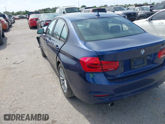 2018 BMW 3 Series 320i with VIN WBA8E1G56JNU92997, listed as a IAAI auction lot 42039869 with 105,085 mi miles. Bid and sale history available at carsss.com. Image 3.