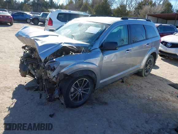 2019 Dodge Journey SE with VIN 3C4PDCBB6KT738488, listed as a IAAI auction lot 41330395 with Not Provided miles and . Bid and sale history available at DreamBid. Image 18.