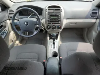 2005 Kia Spectra z VIN KNAFE162755170129, wystawiony jako Copart lot #60217065 z przebiegiem 94 458 mil mil oraz Szkoda całkowita • Salvage title. Historia ofert i sprzedaży dostępna na DreamBid. Obrazek 8.