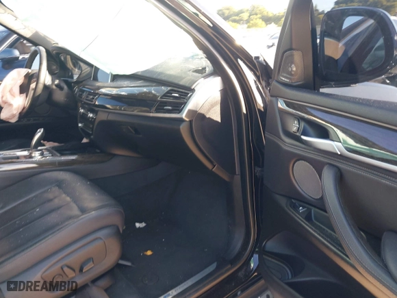 2018 BMW X5 xDrive40e iPerformance with VIN 5UXKT0C59J0W00801, listed as a IAAI auction lot 41081133 with 63,265 mi miles. Bid and sale history available at carsss.com. Image 5.