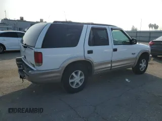 2000 Oldsmobile Bravada z VIN 1GHDT13W9Y2384823, wystawiony jako Copart lot #83105794 z przebiegiem Nie podano mil oraz Tytuł czysty. Historia ofert i sprzedaży dostępna na DreamBid. Obrazek 3.