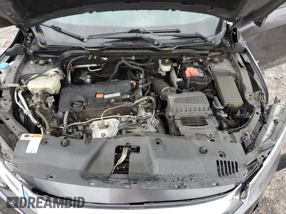 2017 Honda Civic LX z VIN 2HGFC2F56HH521264, wystawiony jako Copart lot #54561605 z przebiegiem 108 099 mil mil oraz Szkoda całkowita • Salvage title. Historia ofert i sprzedaży dostępna na DreamBid. Obrazek 11.