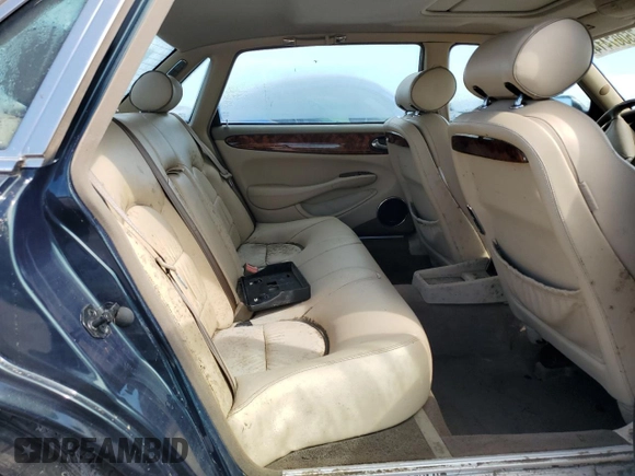 1999 Jaguar XJ with VIN SAJKX6047XC861227, listed as a Copart auction lot 75007414 with Not provided miles and Salvage title. Bid and sale history available at DreamBid. Image 10.